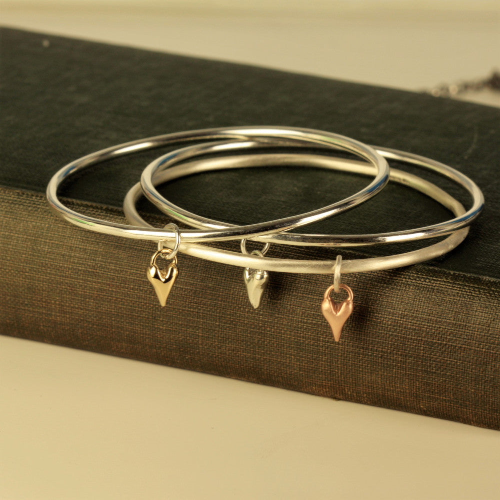 Handmade silver and gold heart bangles