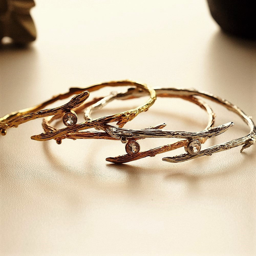 Handmade silver and gold twig topaz bangle