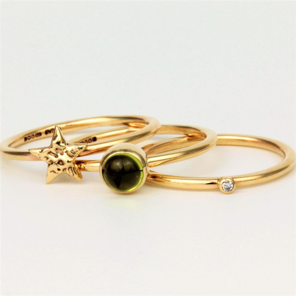 gold star and peridot wildflower diamond ring set