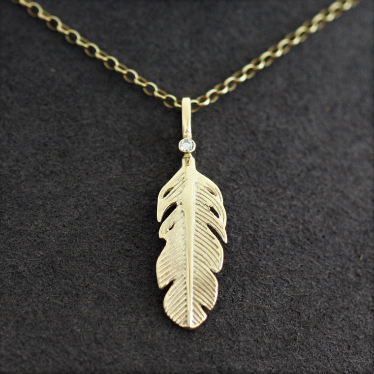 Diamond and solid gold feather necklace