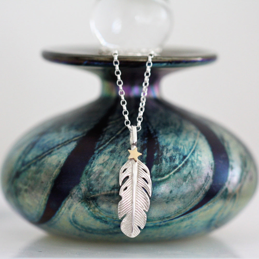 handmade feather and gold star necklace