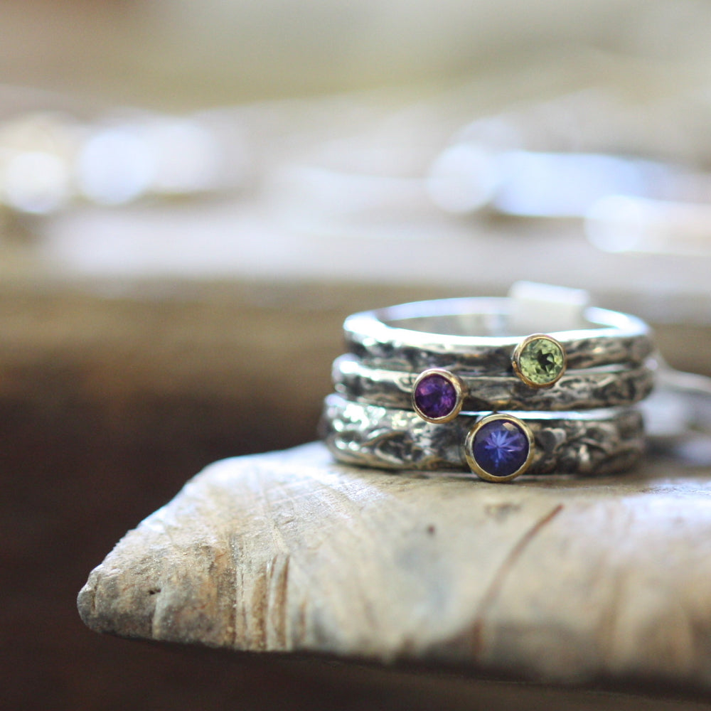 Treasure rings featuring a Tanzanite, Amethyst, Peridot gemstones