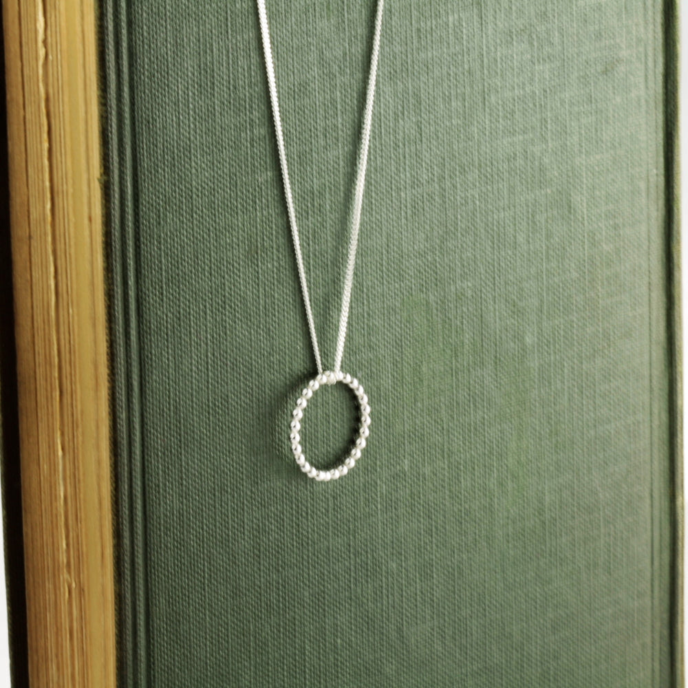 handmade silver circle of life pebble necklace