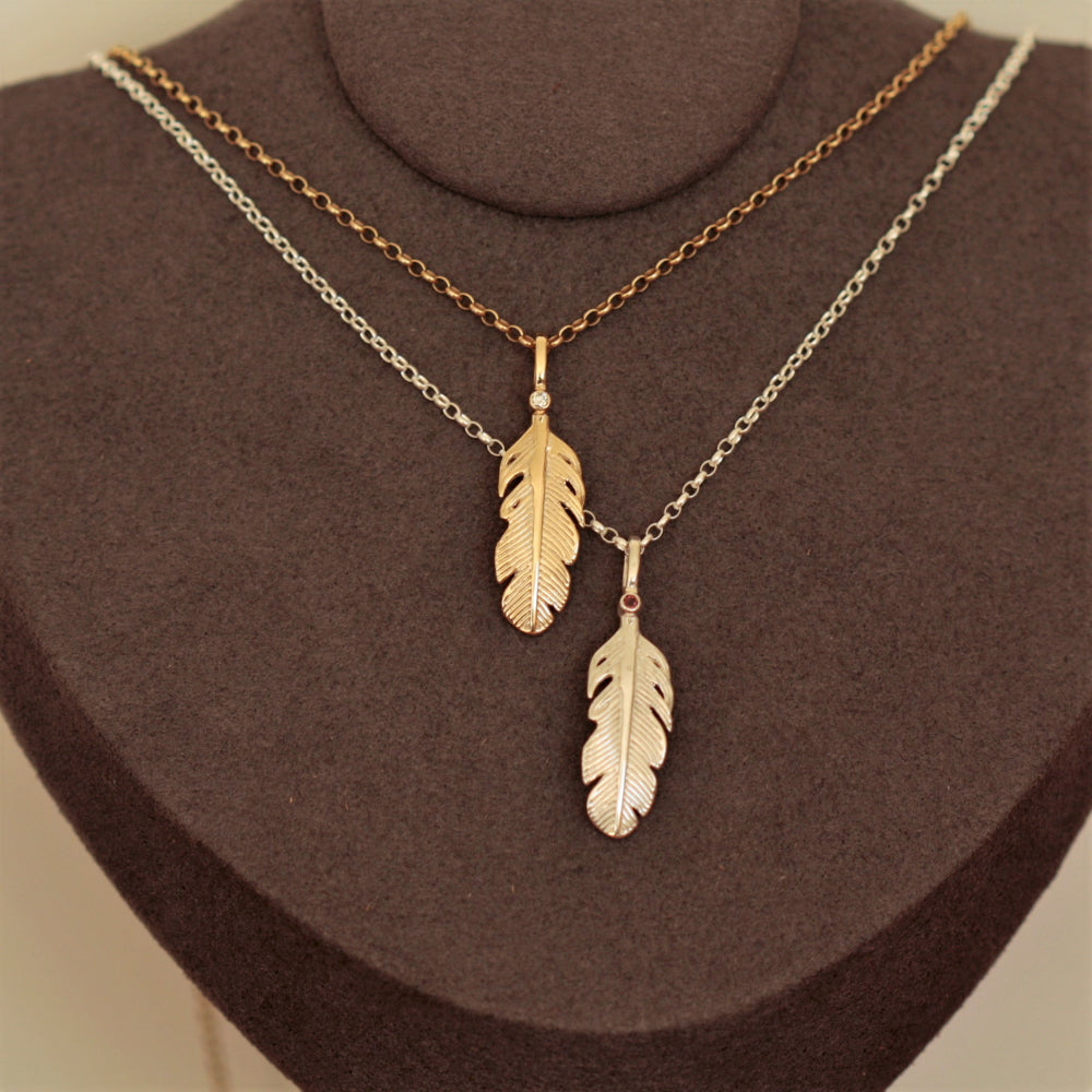 gold and silver gemstone angel feather necklace