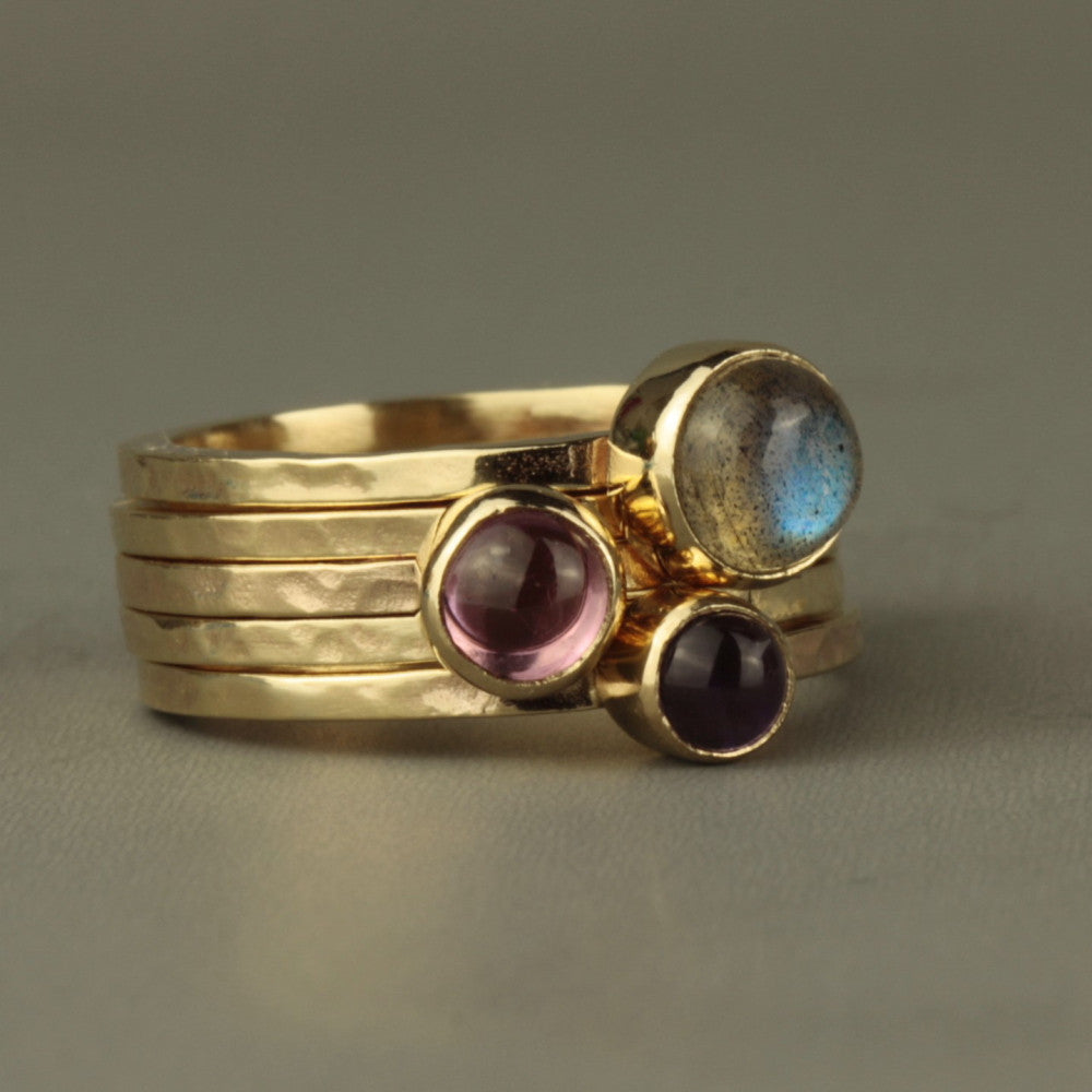 handmade solid gold unique labradorite, pink tourmaline and amethyst hammered stacking rings
