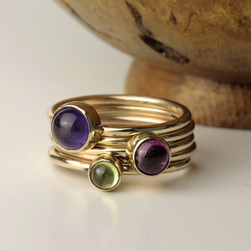 Get the Wild Flower stacking look with this Amethyst Pink Tourmaline and Peridot gold stacking ring