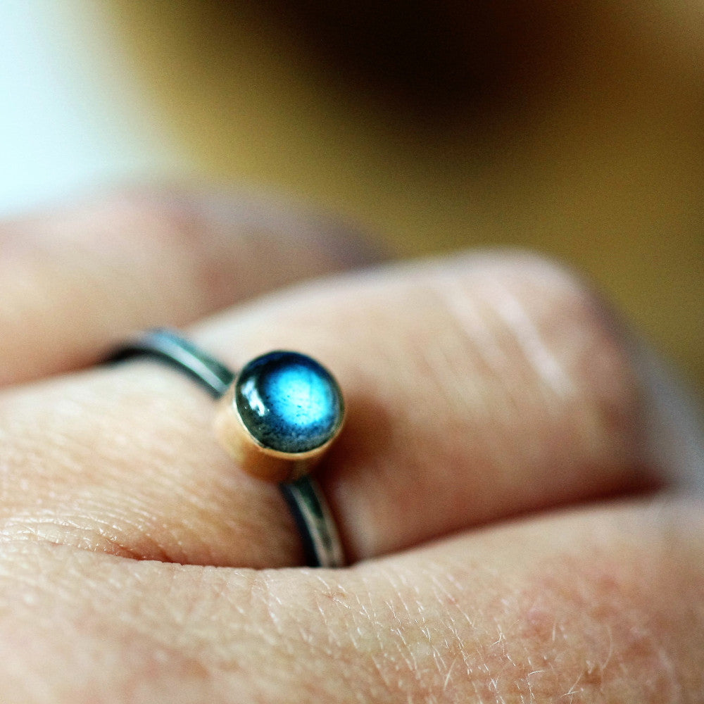 A stunning blue flash from the labradorite blossom silver and gold ring