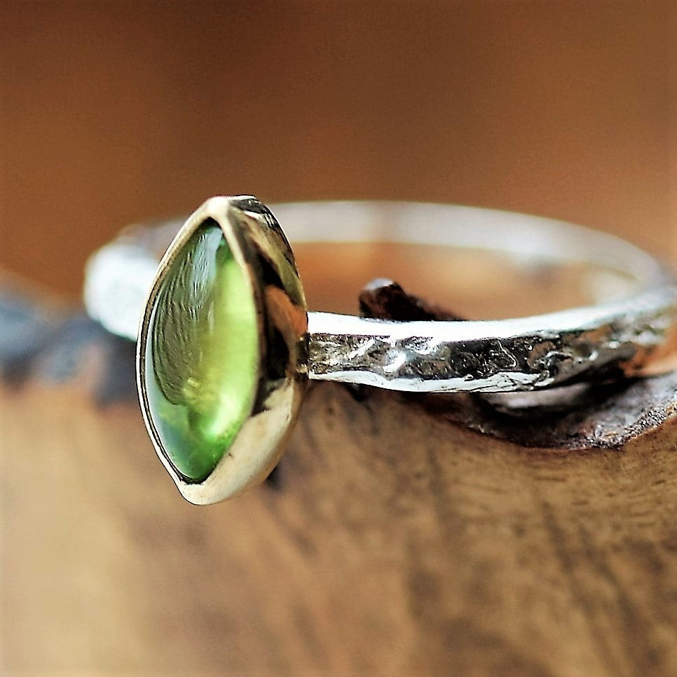Designer peridot birthstone August silver and gold textured ring
