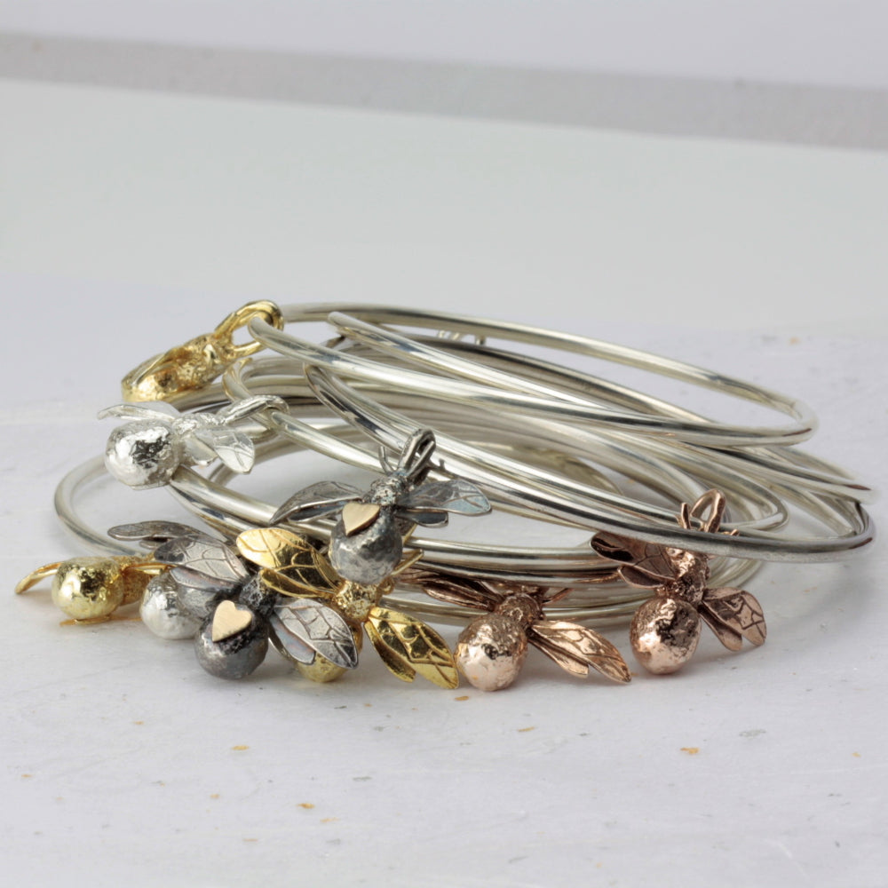 A selection of handcrafted bee bangles