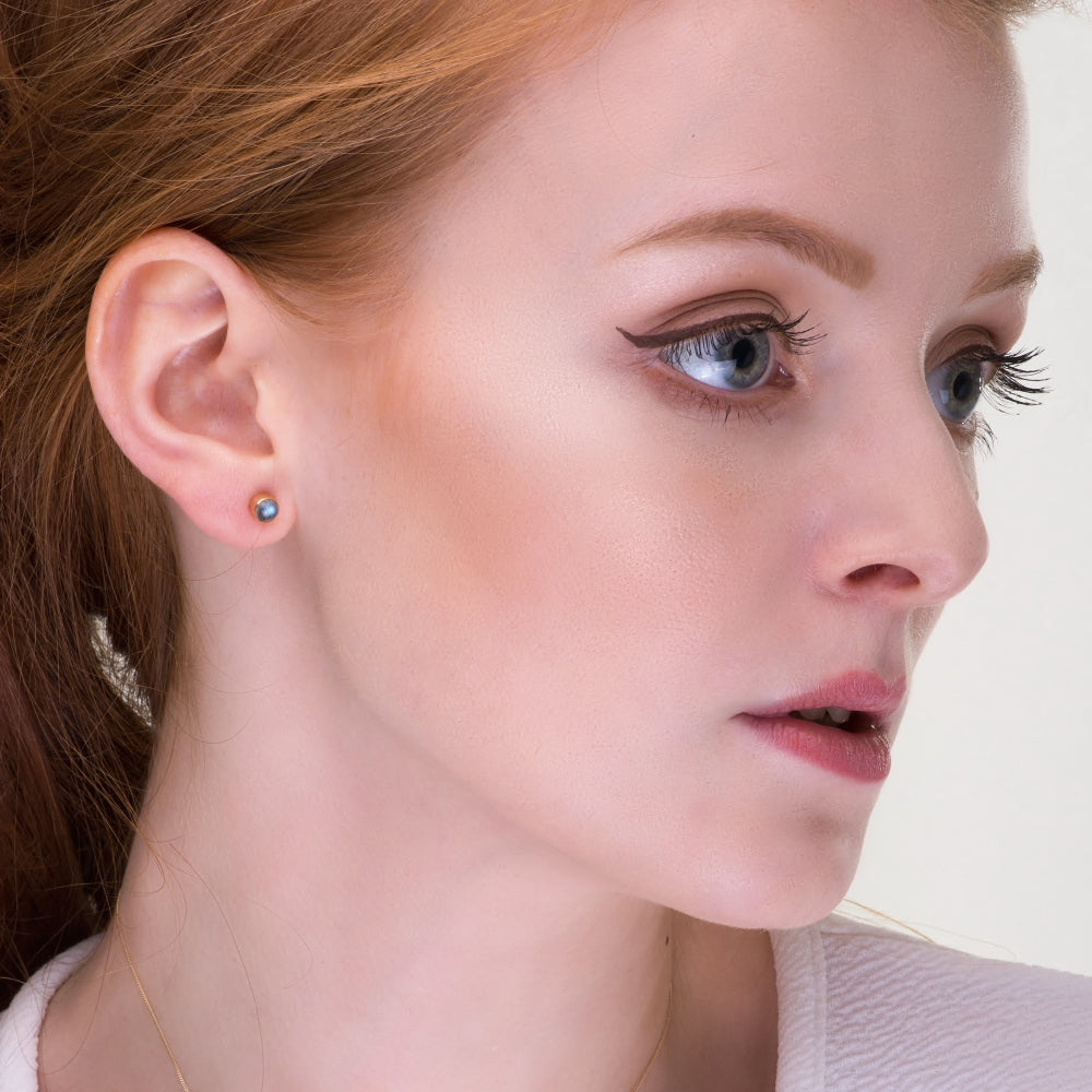 Model wearing Labradorite 4mm stud earrings