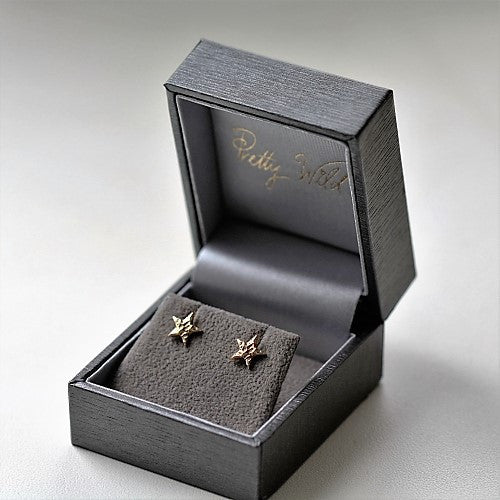 Unusual Gold or Silver Star Studs