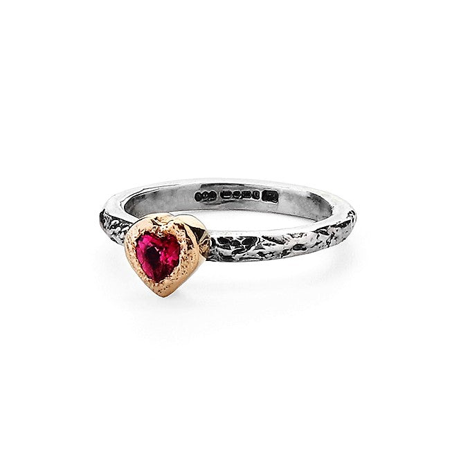 Pink Heart Tourmaline encased in a 9ct gold setting on a textured ring band